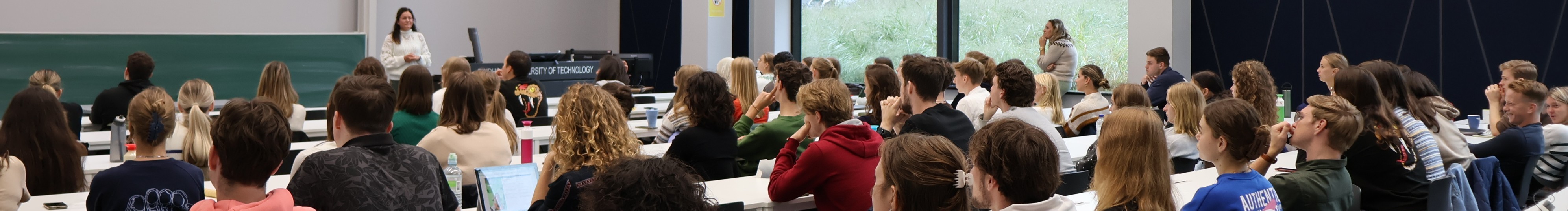 Students attending a lunch lecture